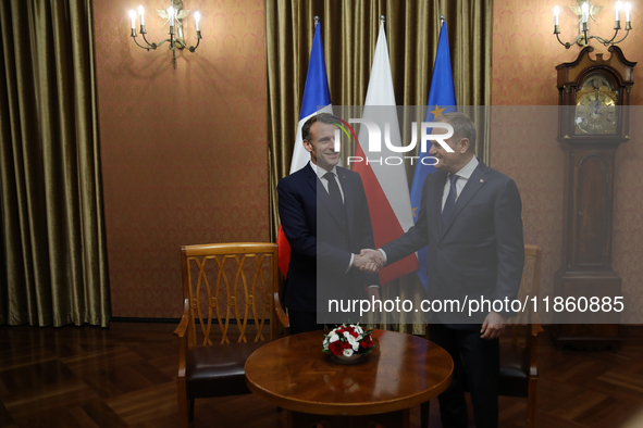 In Warsaw, Poland, on December 12, 2024, President of the French Republic Emmanuel Macron meets with Prime Minister of Poland Donald Tusk at...