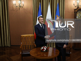 In Warsaw, Poland, on December 12, 2024, President of the French Republic Emmanuel Macron meets with Prime Minister of Poland Donald Tusk at...