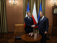 In Warsaw, Poland, on December 12, 2024, President of the French Republic Emmanuel Macron meets with Prime Minister of Poland Donald Tusk at...