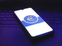 The European Central Bank (ECB) logo appears on the screen of a smartphone in Reno, United States, on December 12, 2024. The central bank is...