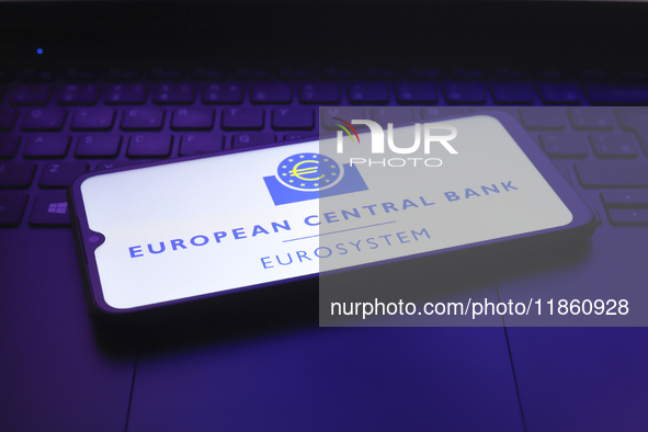 The European Central Bank (ECB) logo appears on the screen of a smartphone in Reno, United States, on December 12, 2024. The central bank is...