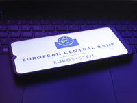 The European Central Bank (ECB) logo appears on the screen of a smartphone in Reno, United States, on December 12, 2024. The central bank is...