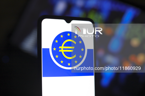 The European Central Bank (ECB) logo appears on the screen of a smartphone in Reno, United States, on December 12, 2024. The central bank is...