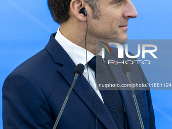 French President Emmanuel Macron speaking to the press after his meeting with Prime Minister Donald Tusk at the Prime Minister's Office in W...