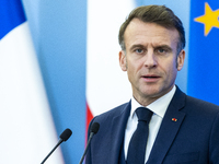 French President Emmanuel Macron speaking to the press after his meeting with Prime Minister Donald Tusk at the Prime Minister's Office in W...