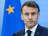 French President Emmanuel Macron speaking to the press after his meeting with Prime Minister Donald Tusk at the Prime Minister's Office in W...