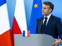 French President Emmanuel Macron speaking to the press after his meeting with Prime Minister Donald Tusk at the Prime Minister's Office in W...