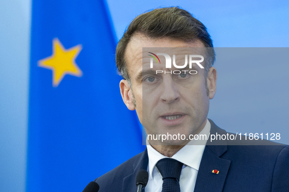 French President Emmanuel Macron speaking to the press after his meeting with Prime Minister Donald Tusk at the Prime Minister's Office in W...