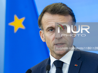 French President Emmanuel Macron speaking to the press after his meeting with Prime Minister Donald Tusk at the Prime Minister's Office in W...