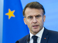 French President Emmanuel Macron speaking to the press after his meeting with Prime Minister Donald Tusk at the Prime Minister's Office in W...