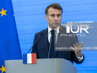 French President Emmanuel Macron speaking to the press after his meeting with Prime Minister Donald Tusk at the Prime Minister's Office in W...