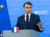 French President Emmanuel Macron speaking to the press after his meeting with Prime Minister Donald Tusk at the Prime Minister's Office in W...