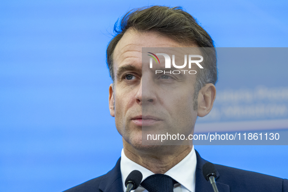 French President Emmanuel Macron speaking to the press after his meeting with Prime Minister Donald Tusk at the Prime Minister's Office in W...