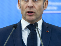 French President Emmanuel Macron speaking to the press after his meeting with Prime Minister Donald Tusk at the Prime Minister's Office in W...