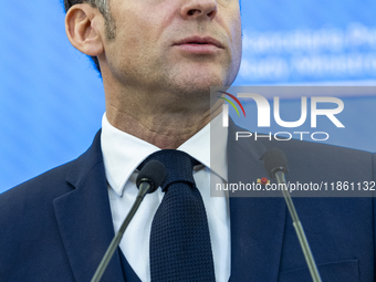 French President Emmanuel Macron speaking to the press after his meeting with Prime Minister Donald Tusk at the Prime Minister's Office in W...