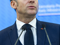 French President Emmanuel Macron speaking to the press after his meeting with Prime Minister Donald Tusk at the Prime Minister's Office in W...