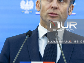 French President Emmanuel Macron speaking to the press after his meeting with Prime Minister Donald Tusk at the Prime Minister's Office in W...