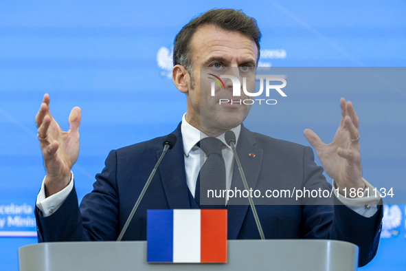 French President Emmanuel Macron speaking to the press after his meeting with Prime Minister Donald Tusk at the Prime Minister's Office in W...