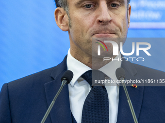 French President Emmanuel Macron speaking to the press after his meeting with Prime Minister Donald Tusk at the Prime Minister's Office in W...