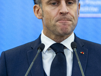 French President Emmanuel Macron speaking to the press after his meeting with Prime Minister Donald Tusk at the Prime Minister's Office in W...