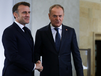 In Warsaw, Poland, on December 12, 2024, French President Emmanuel Macron meets with Polish Prime Minister Donald Tusk at the Chancellery of...