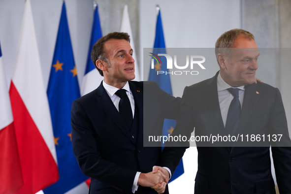 In Warsaw, Poland, on December 12, 2024, French President Emmanuel Macron meets with Polish Prime Minister Donald Tusk at the Chancellery of...