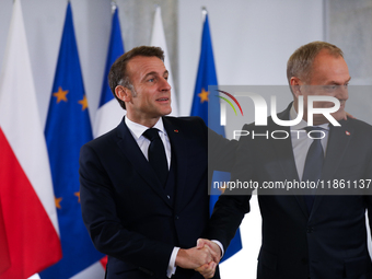 In Warsaw, Poland, on December 12, 2024, French President Emmanuel Macron meets with Polish Prime Minister Donald Tusk at the Chancellery of...