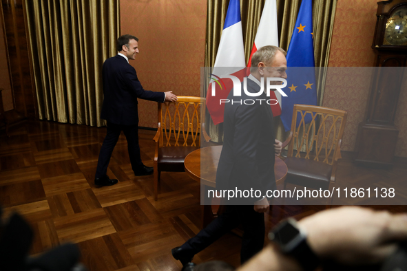 In Warsaw, Poland, on December 12, 2024, French President Emmanuel Macron meets with Polish Prime Minister Donald Tusk at the Chancellery of...