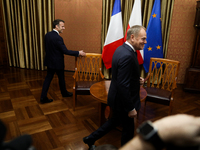 In Warsaw, Poland, on December 12, 2024, French President Emmanuel Macron meets with Polish Prime Minister Donald Tusk at the Chancellery of...