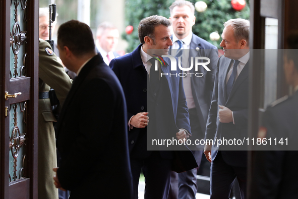 In Warsaw, Poland, on December 12, 2024, French President Emmanuel Macron meets with Polish Prime Minister Donald Tusk at the Chancellery of...