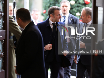 In Warsaw, Poland, on December 12, 2024, French President Emmanuel Macron meets with Polish Prime Minister Donald Tusk at the Chancellery of...