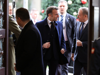 In Warsaw, Poland, on December 12, 2024, French President Emmanuel Macron meets with Polish Prime Minister Donald Tusk at the Chancellery of...