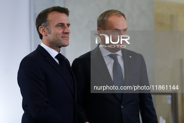 In Warsaw, Poland, on December 12, 2024, French President Emmanuel Macron meets with Polish Prime Minister Donald Tusk at the Chancellery of...