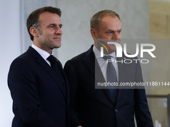 In Warsaw, Poland, on December 12, 2024, French President Emmanuel Macron meets with Polish Prime Minister Donald Tusk at the Chancellery of...