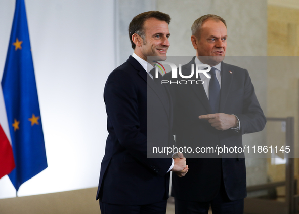 In Warsaw, Poland, on December 12, 2024, French President Emmanuel Macron meets with Polish Prime Minister Donald Tusk at the Chancellery of...