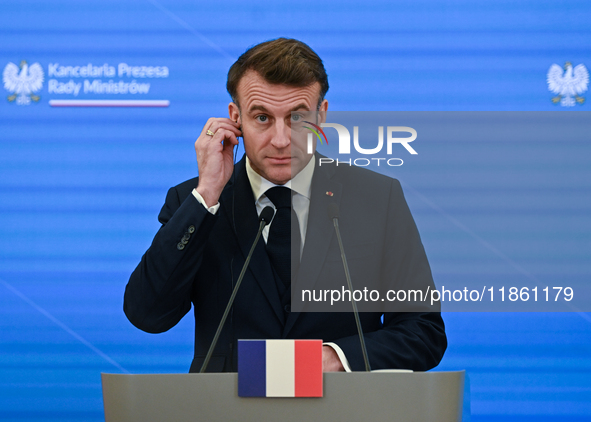 WARSAW, POLAND - DECEMBER 12:
French President Emmanuel Macron delivers remarks during a joint press conference with Polish Prime Minister D...