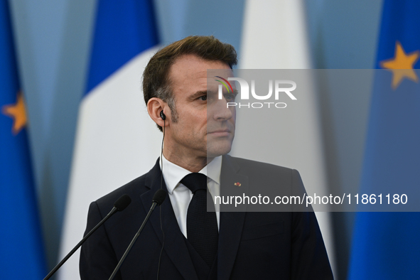 WARSAW, POLAND - DECEMBER 12:
French President Emmanuel Macron during a joint press conference with Polish Prime Minister Donald Tusk at the...