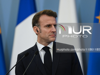 WARSAW, POLAND - DECEMBER 12:
French President Emmanuel Macron during a joint press conference with Polish Prime Minister Donald Tusk at the...