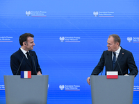 WARSAW, POLAND - DECEMBER 12:
French President Emmanuel Macron (L) during a joint press conference with Polish Prime Minister Donald Tusk (R...