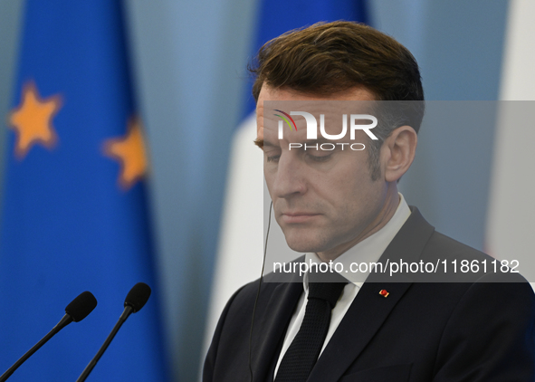 WARSAW, POLAND - DECEMBER 12:
French President Emmanuel Macron during a joint press conference with Polish Prime Minister Donald Tusk at the...