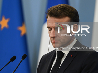 WARSAW, POLAND - DECEMBER 12:
French President Emmanuel Macron during a joint press conference with Polish Prime Minister Donald Tusk at the...