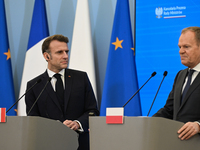 WARSAW, POLAND - DECEMBER 12:
French President Emmanuel Macron (L) during a joint press conference with Polish Prime Minister Donald Tusk (R...