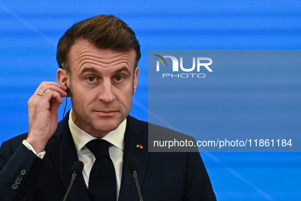 WARSAW, POLAND - DECEMBER 12:
French President Emmanuel Macron delivers remarks during a joint press conference with Polish Prime Minister D...