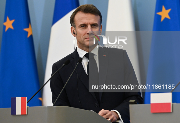 WARSAW, POLAND - DECEMBER 12:
French President Emmanuel Macron during a joint press conference with Polish Prime Minister Donald Tusk at the...