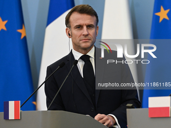 WARSAW, POLAND - DECEMBER 12:
French President Emmanuel Macron during a joint press conference with Polish Prime Minister Donald Tusk at the...