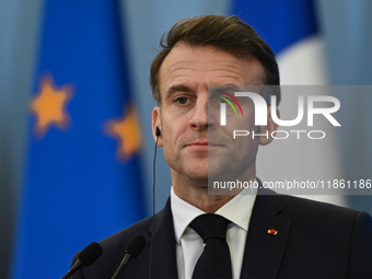 WARSAW, POLAND - DECEMBER 12:
French President Emmanuel Macron during a joint press conference with Polish Prime Minister Donald Tusk at the...