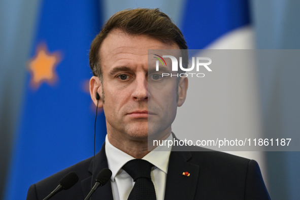 WARSAW, POLAND - DECEMBER 12:
French President Emmanuel Macron during a joint press conference with Polish Prime Minister Donald Tusk at the...