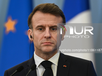 WARSAW, POLAND - DECEMBER 12:
French President Emmanuel Macron during a joint press conference with Polish Prime Minister Donald Tusk at the...