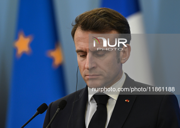 WARSAW, POLAND - DECEMBER 12:
French President Emmanuel Macron during a joint press conference with Polish Prime Minister Donald Tusk at the...