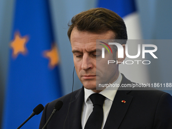 WARSAW, POLAND - DECEMBER 12:
French President Emmanuel Macron during a joint press conference with Polish Prime Minister Donald Tusk at the...